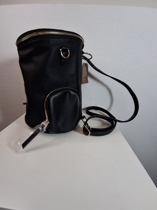SWG Handbags - SWG Black Pebbled Sling Barrel Backpack with Gold Accents